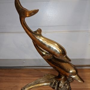 Brass Dolphins statue